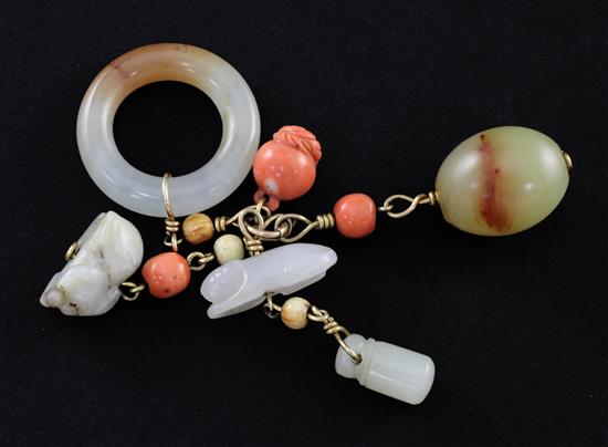 A collection of Chinese gold mounted jade and coral carvings and beads, Qing dynasty, total length 10.5cm